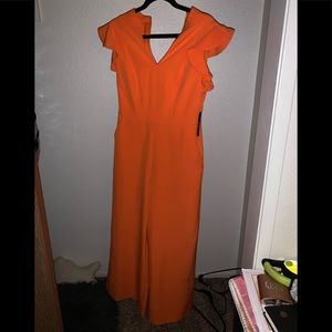 Orange ruffle sleeve jumpsuit